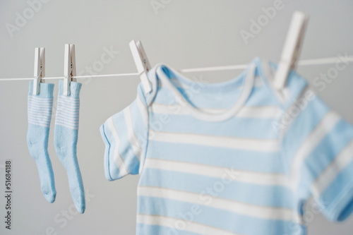 Photo: blue baby clothes on the clothesline blue baby clothes on the clothesline