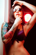pretty young girl with tattoo. lovely woman.