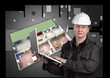 Portrait of a architect with plan in background