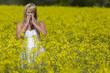 Model In Field Of Flowers