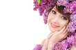 Young woman with flowers on white background