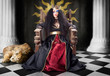 Photo: Fashion queen in crown sitting in jester court Fashion queen in crown sitting in jester court