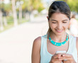 Woman texting on her phone