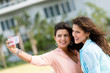 Women taking a picture with the phone