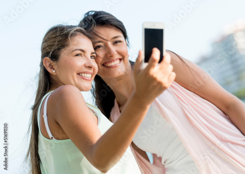 Photo: Friends taking a self portrait Friends taking a self portrait