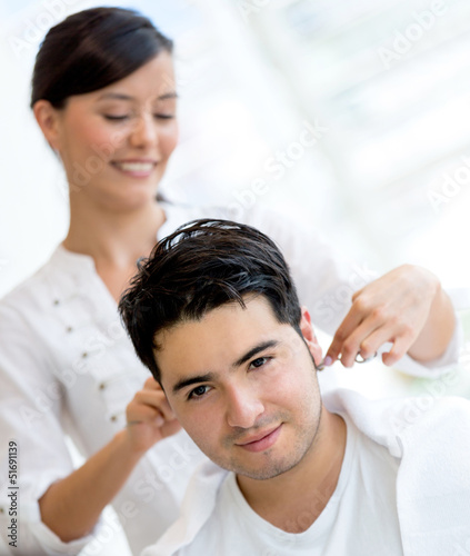 Photo: Man getting a haircut Man getting a haircut