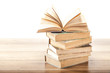 open vintage book on wooden  background