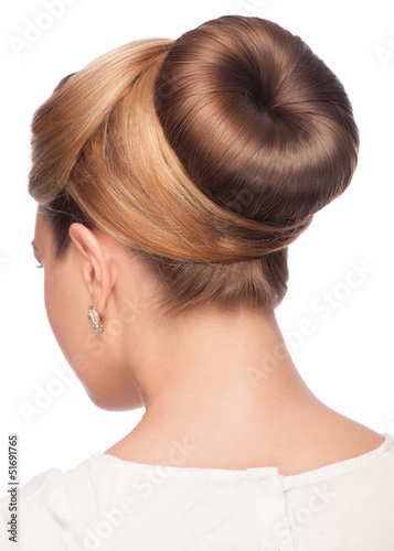 Photo: Woman with elegant hair bun Woman with elegant hair bun