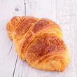 Photo: croissant on wood croissant on wood