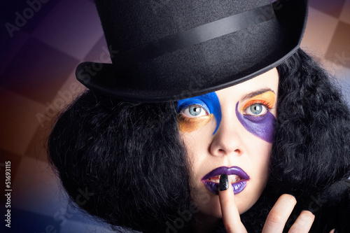 Photo: Eccentric mad fashion hatter in colourful makeup Eccentric mad fashion hatter in colourful makeup