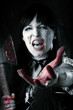 female zombie with bloody axe
