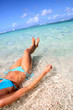 Closeup of woman body bathing in Caribbean sea