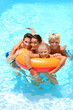 Couple with children enjoying bath time