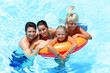 Couple with children enjoying bath time