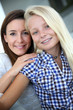 Foto: Portrait of young woman with teenager Portrait of young woman with teenager