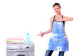A pretty young woman doing laundry