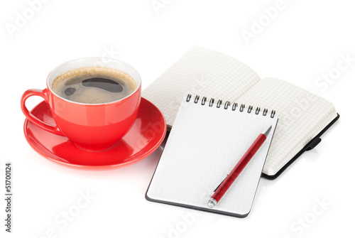 Photo: Red coffee cup and office supplies Red coffee cup and office supplies