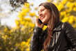 young latin woman using cellphone