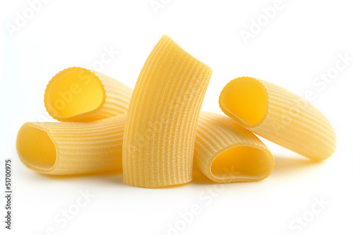 Photo: heap of italian pasta on white background heap of italian pasta on white background