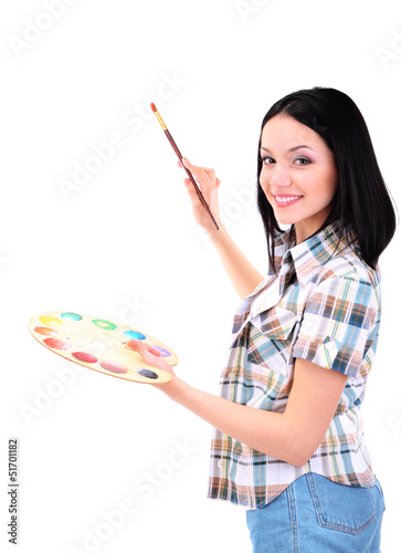 Photo: Beautiful young woman painter with brushes and palette at work, Beautiful young woman painter with brushes and palette at work,