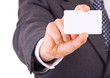 Business man showing blank card.