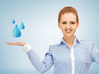 woman showing blue water drops