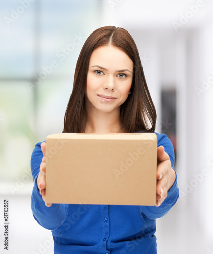 Photo: businesswoman delivering box businesswoman delivering box