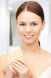 Photo: young beautiful woman with pills young beautiful woman with pills