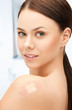 beautiful woman with medical patch or plaster