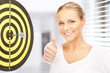 businesswoman with dart and target