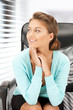 young businesswoman sitting in chair