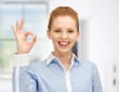 young woman showing ok sign