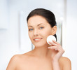 beautiful woman with cotton pad