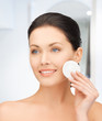 beautiful woman with cotton pad