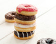 Photo: Fresh tasty donuts with different glaze Fresh tasty donuts with different glaze