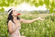 Happy girl with red flower