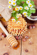 Photo: Waffles with honey and nuts on a wooden surface Waffles with honey and nuts on a wooden surface