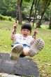 Kid on swing