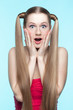 Surprised girl in red dress