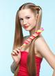 Young woman with lollipop