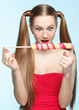 Young woman with lollipop