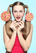 Young woman with lollipop