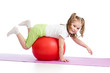 Kid having fun with  gymnastic ball isolated