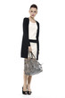 Full length of fashion model with big bag. Isolated