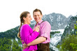 canvas print picture - Happy couple in Alpine meadow