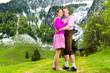 canvas print picture - Happy couple in Alpine meadow