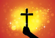 Person holding holy cross,christian religious symbol,in hand(fis