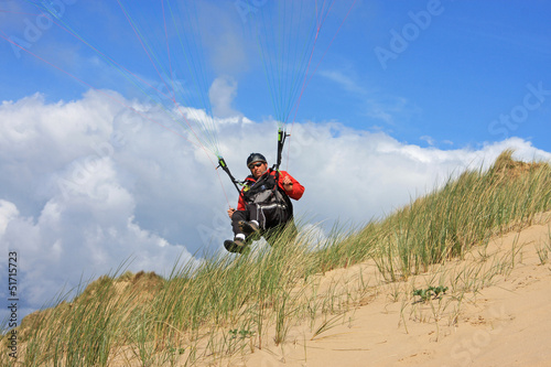 Photo: paraglider on sand dunes paraglider on sand dunes
