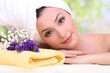 Beautiful young woman with towel