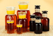 Medicine bottles on beige background